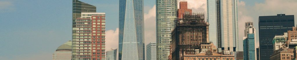 A wide view of a city skyline of high-rise towers